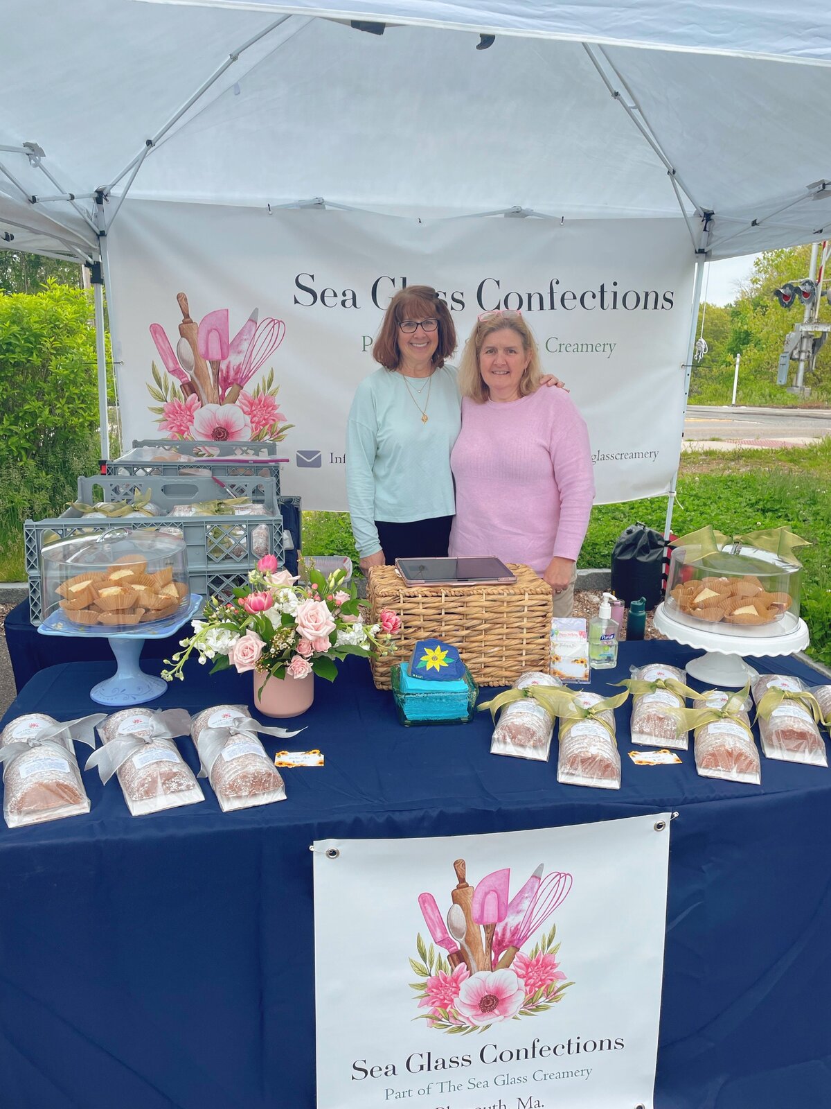Donna and Leslie at Sea Glass Confections farmers market booth
