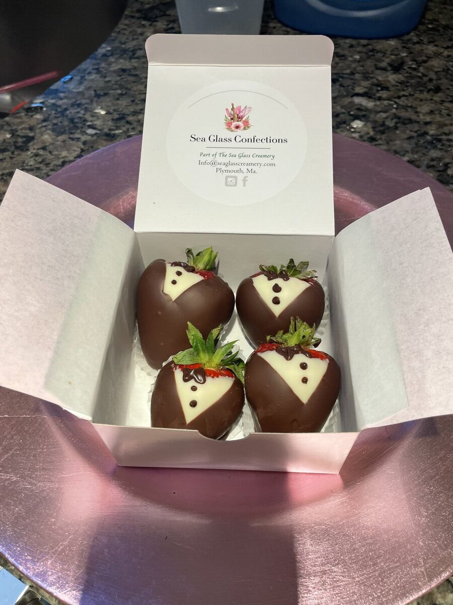 Chocolate covered strawberries decorated as tuxedos
