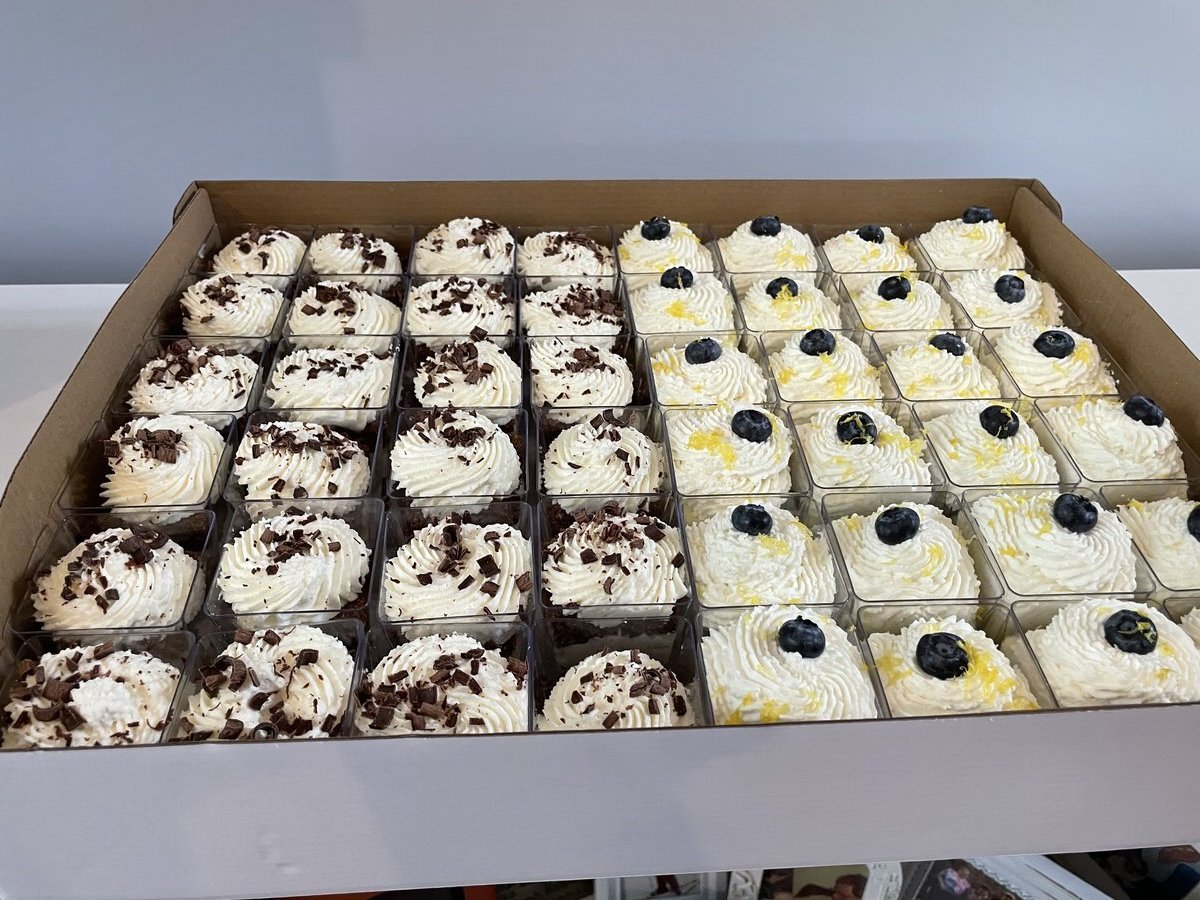 Individual dessert cups with layered treats for catering